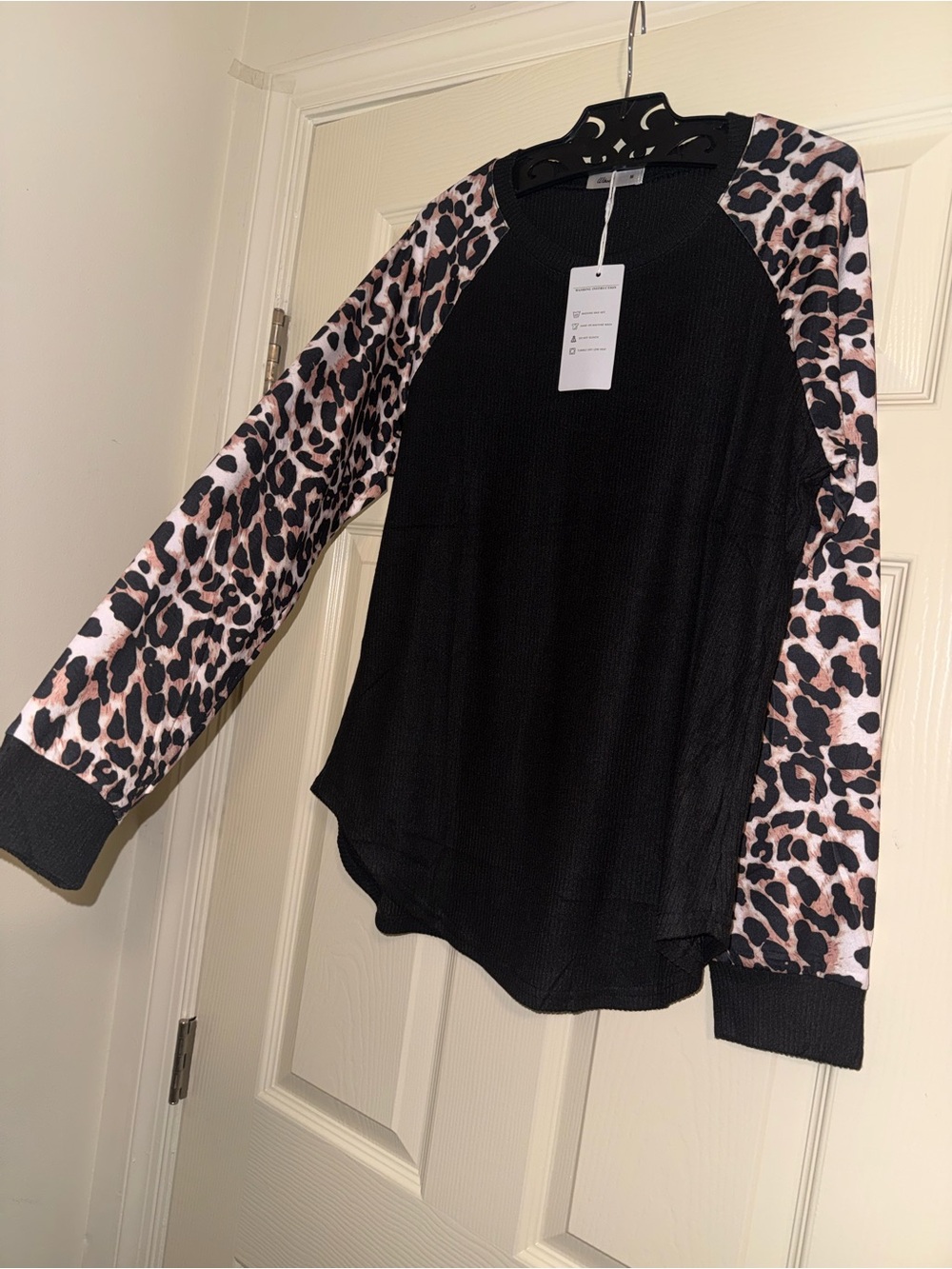 Black Pullover with Pink Leopard Raglan Sleeves